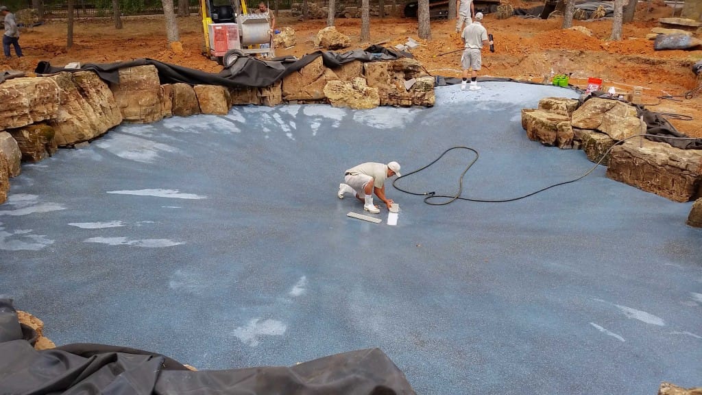 A pool undergoing acid wash treatment, showcasing the cleaning process for Lone Star Plastering Texas.