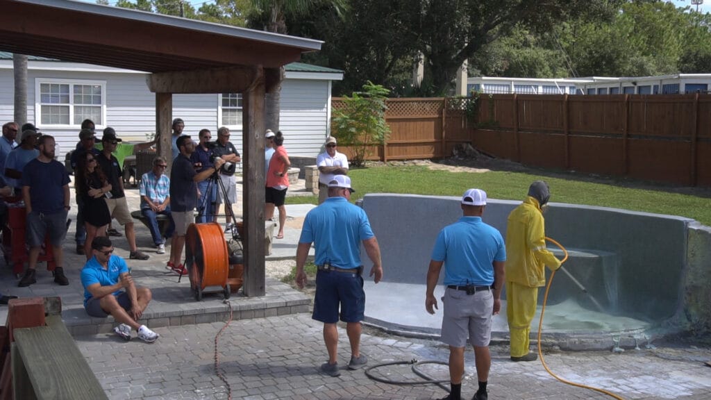 Pool Wash training benefits - A group of trainees engaged in Pool Wash training, learning techniques that highlight the benef