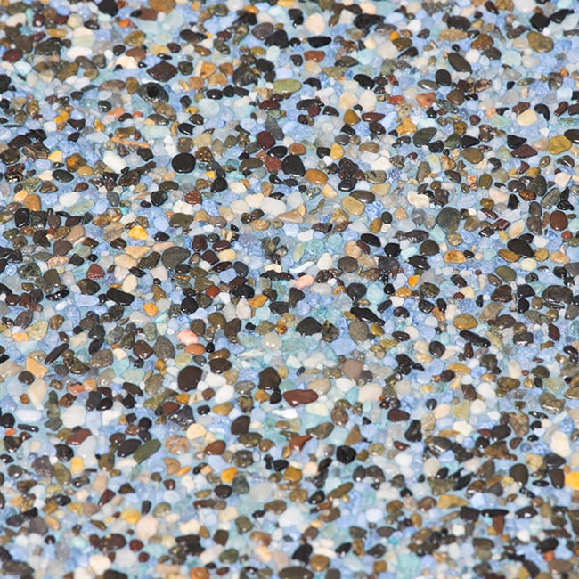 Large pebble texture in various shades of gray and brown, ideal for choosing pool colors and textures Jacksonville FL.