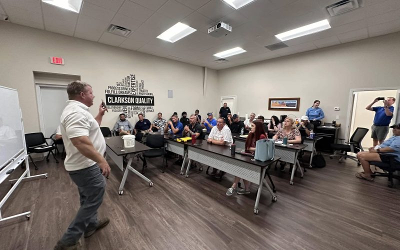 pool plaster training Jacksonville FL - A professional demonstrating pool plaster techniques during training in Jacksonville