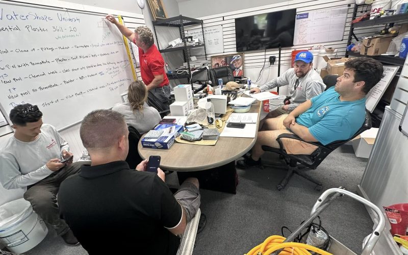 pool plaster training Jacksonville FL - A worker applying pool plaster during training in Jacksonville, FL, showcasing techni