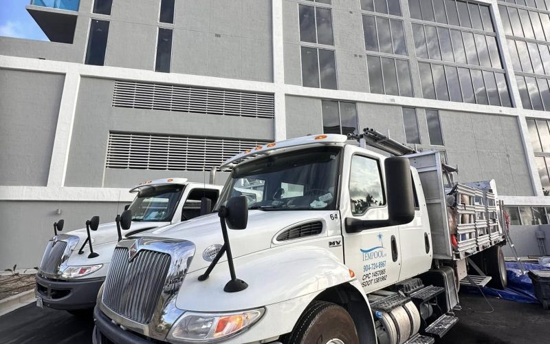 pool plastering consulting jacksonville fl - A close-up of freshly plastered pool walls, showcasing smooth texture and vibran
