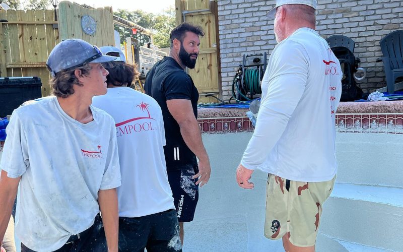 pool plaster training Jacksonville FL - A trainer demonstrating pool plaster techniques during a workshop in Jacksonville, FL